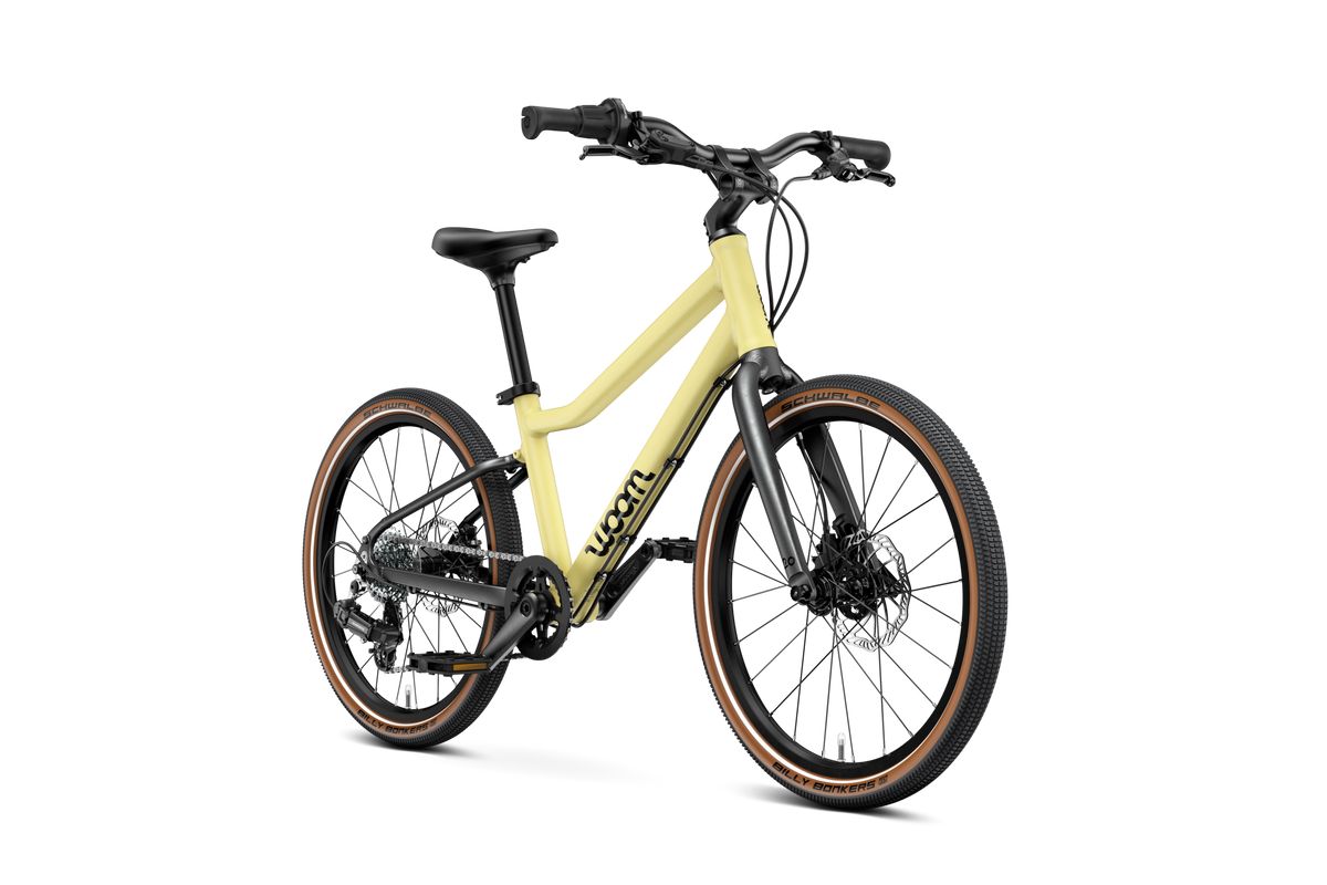 Bicicleta infantil woom EXPLORE 4 en Amarillo suave, perspectiva #Color_Amarillo suave