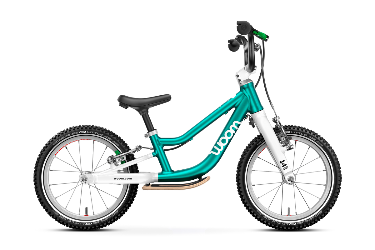 Bicicleta sin pedales WOOM GO 1 PLUS en Turquesa, lateral #Color_Turquesa