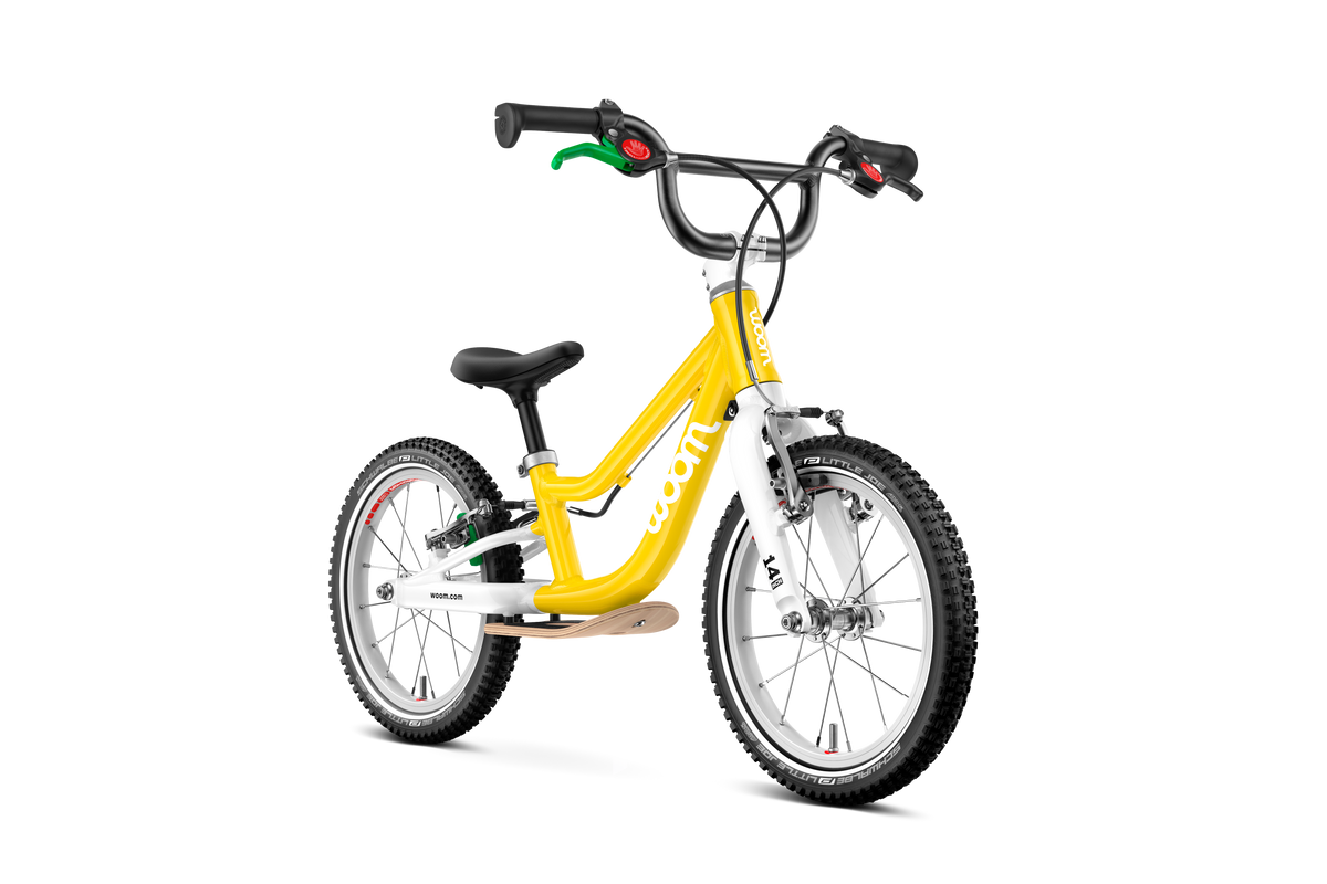 Bicicleta sin pedales WOOM GO 1 PLUS en Amarillo, perspectiva #Color_Amarillo