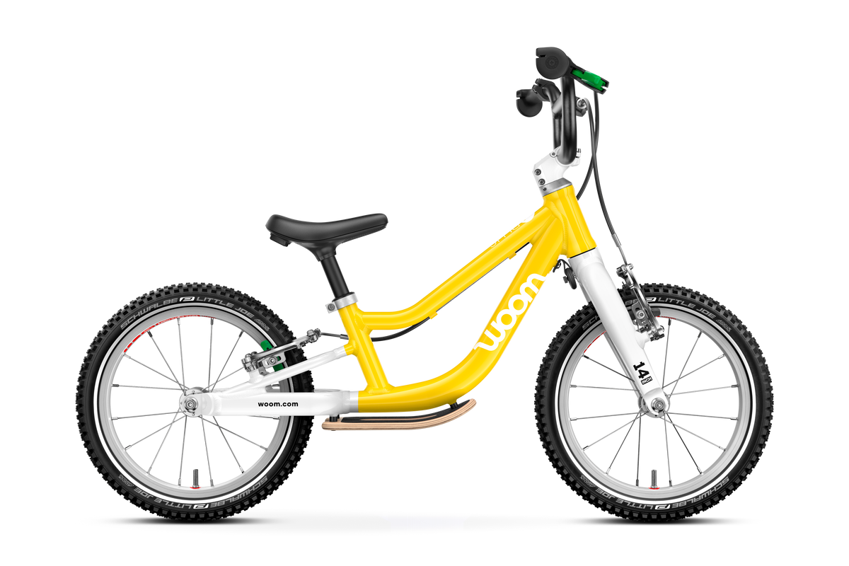 Bicicleta sin pedales WOOM GO 1 PLUS en Amarillo, lateral #Color_Amarillo