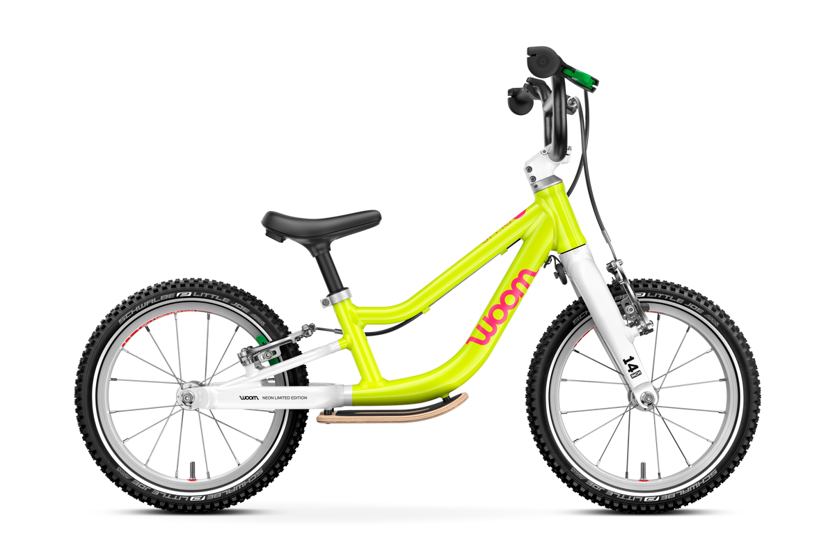 Bicicleta sin pedales WOOM GO 1 PLUS en Lima neón, perspectiva #Color_Lima neón