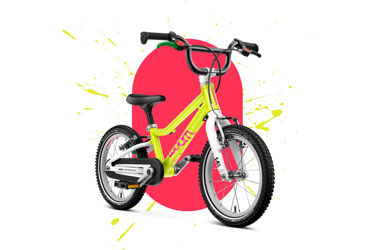 Bicicleta infantil WOOM GO 2 en Lima neón, lateral #Color_Lima neón