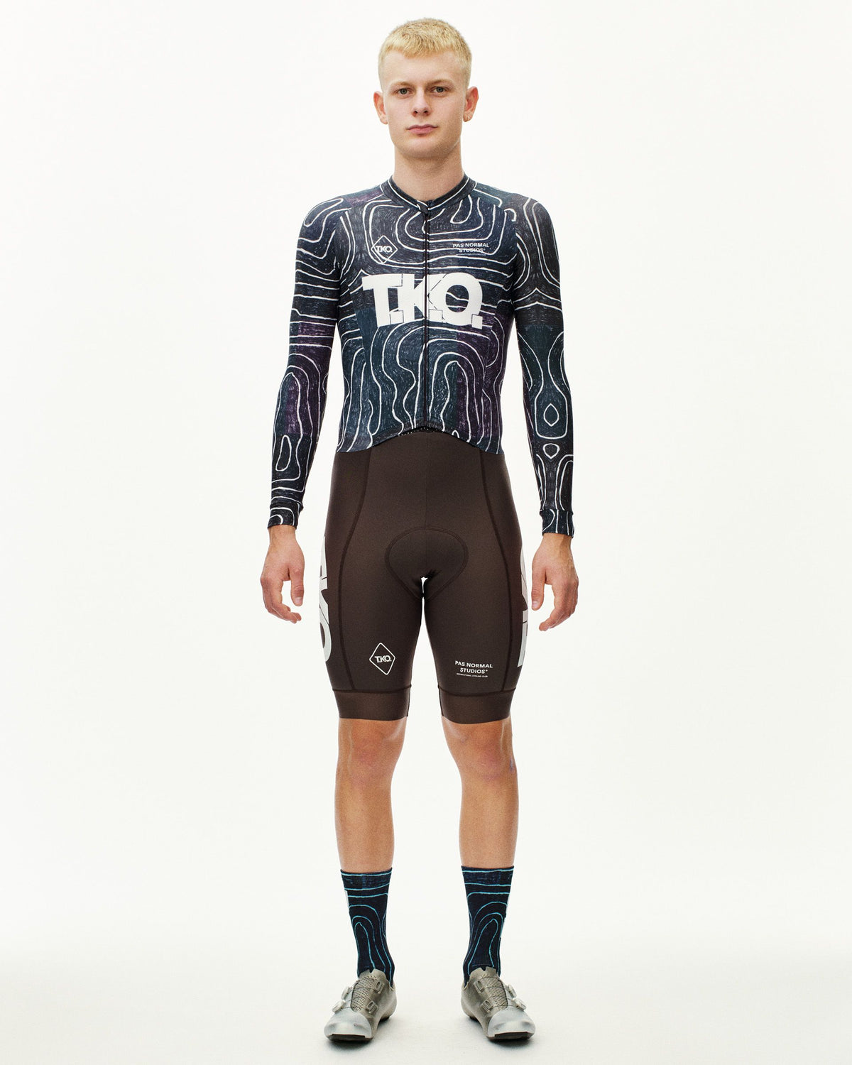Black Multi T.K.O. Thermal Speedsuit on model, front view with topographic allover print and white T.K.O. chest logo #Color_T.K.O. Black Multi