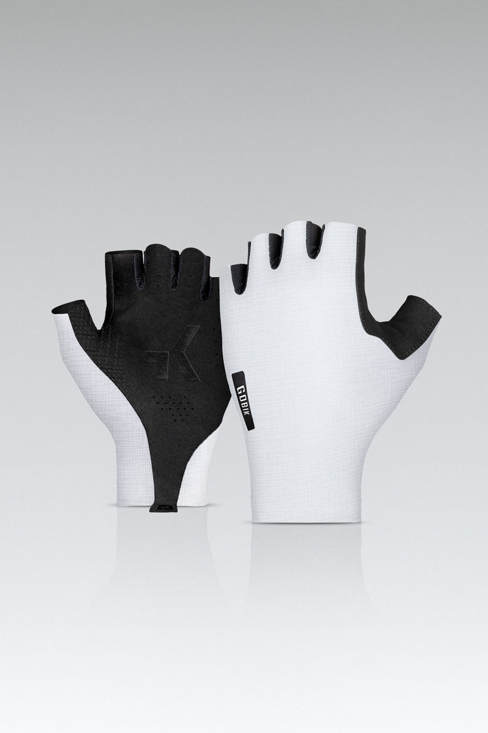 Guantes Gobik Mamba 2.0 en White, bodegón del par con el dorso blanco y la palma negra #Color_White