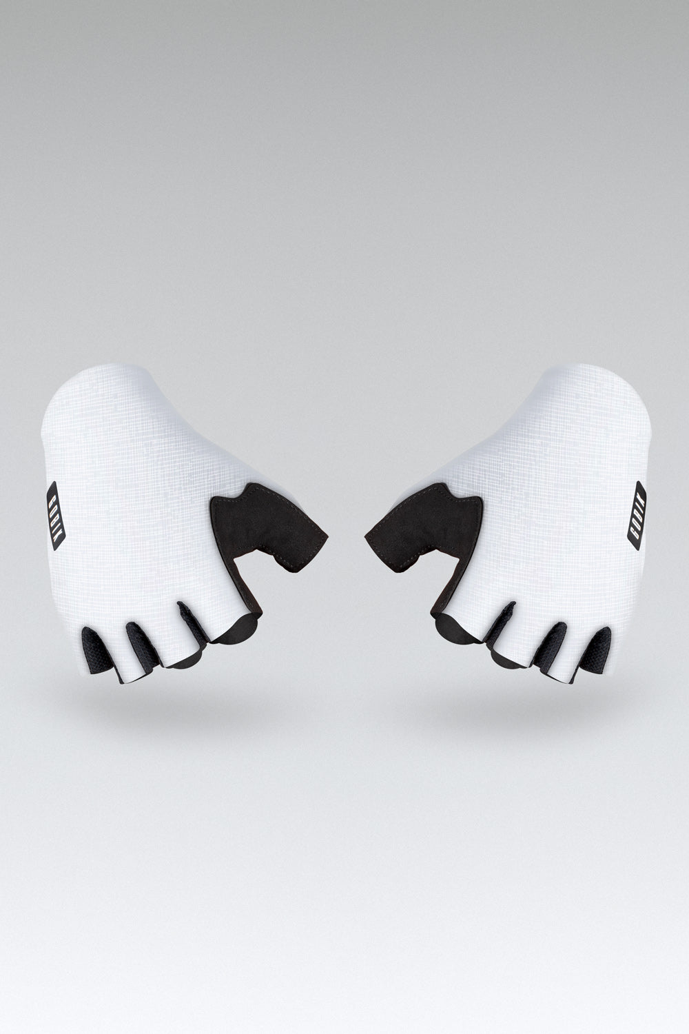 Guantes Gobik Mamba 2.0 en White, bodegón del par visto desde arriba con los puños en primer plano #Color_White
