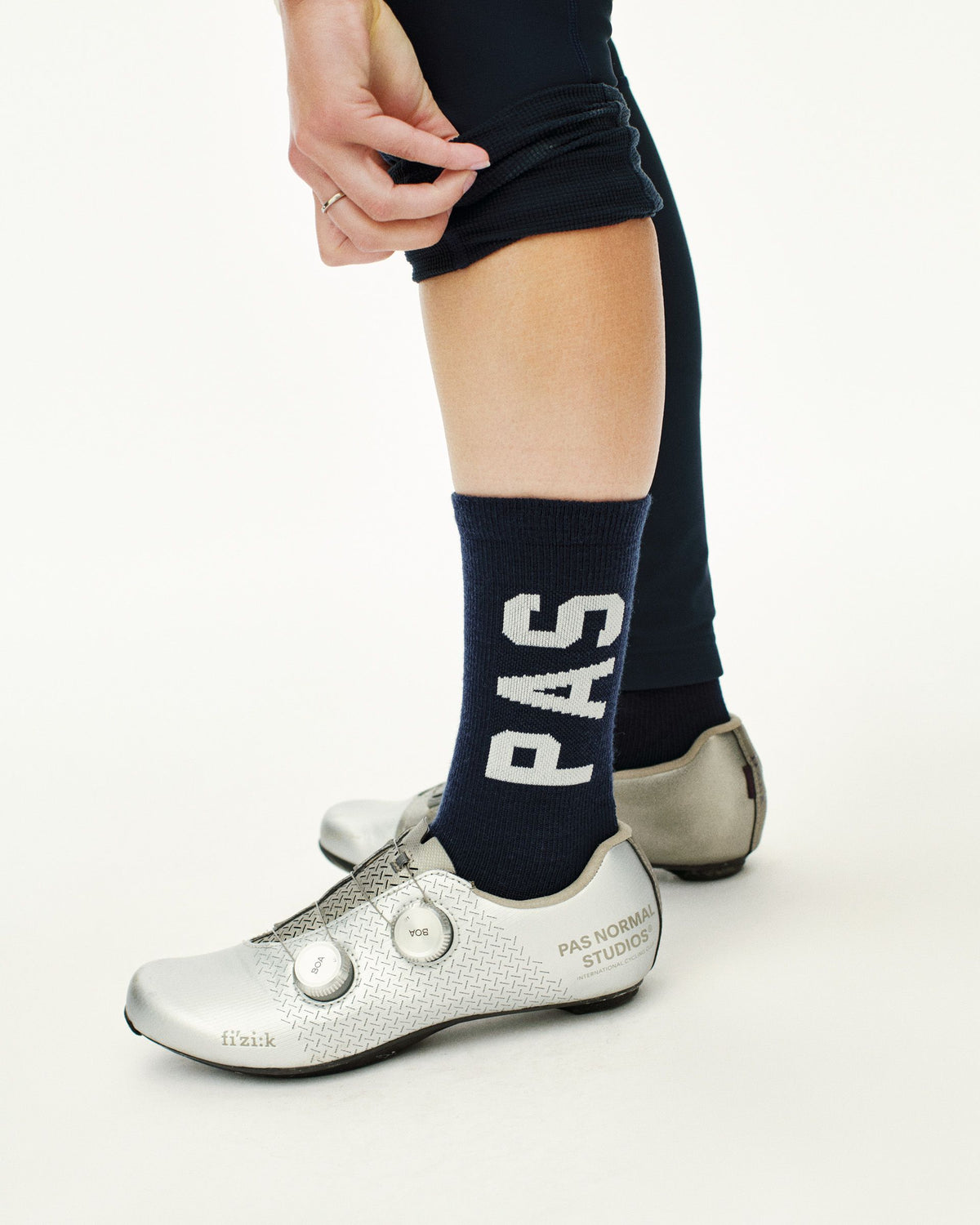 Navy PAS Thermal Wool cycling socks on model with white PAS text branding #Color_Navy
