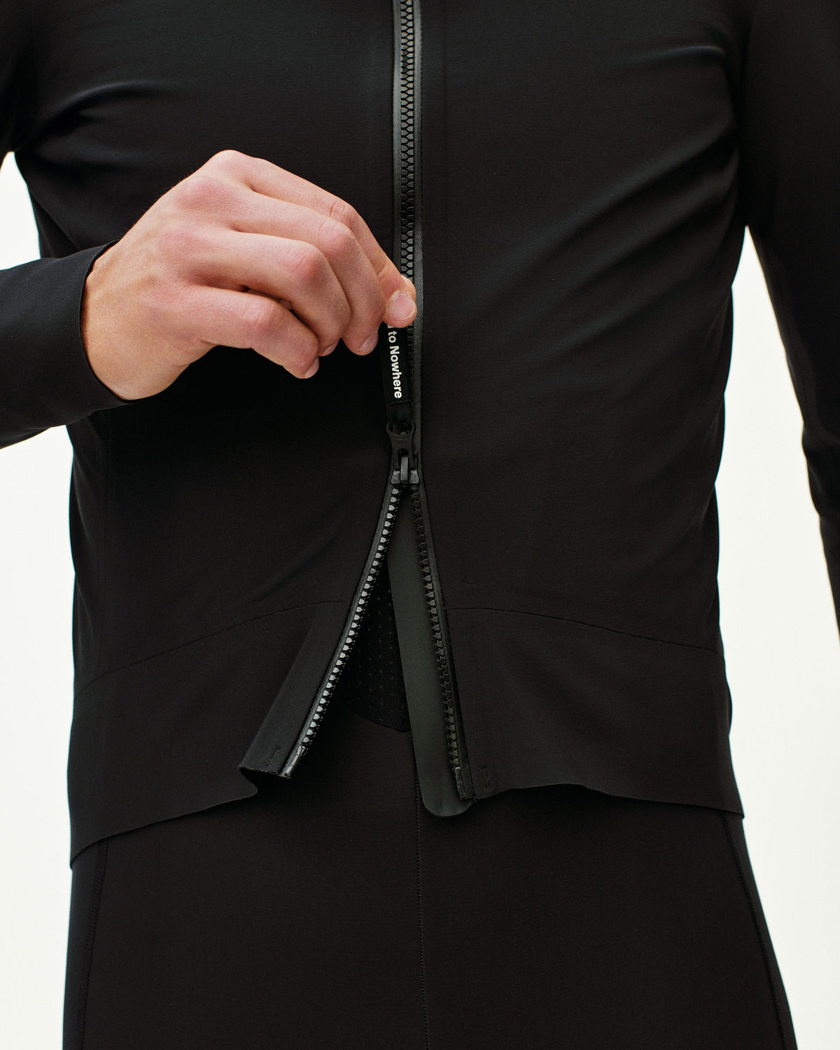 Black Mechanism Thermal cycling jacket on model showing front zip detail #Color_Black
