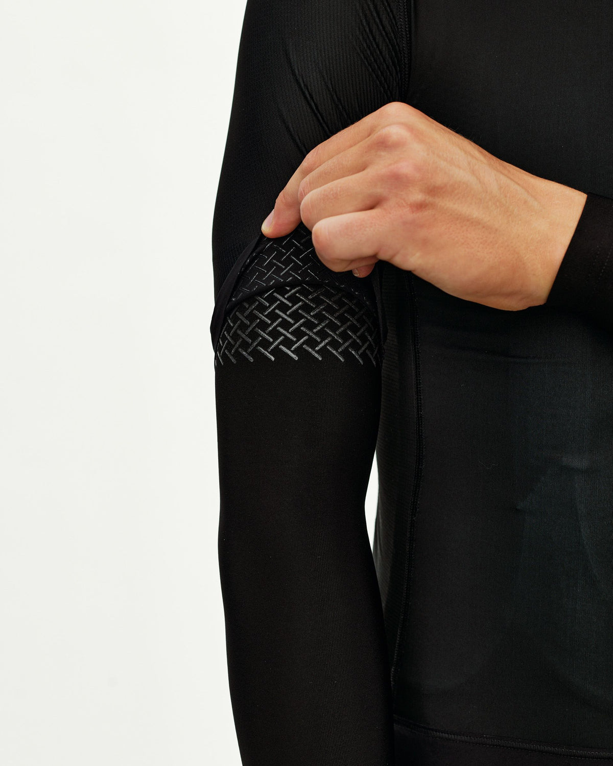 Logo Arm Warmers Black detalle de agarre #Color_Black