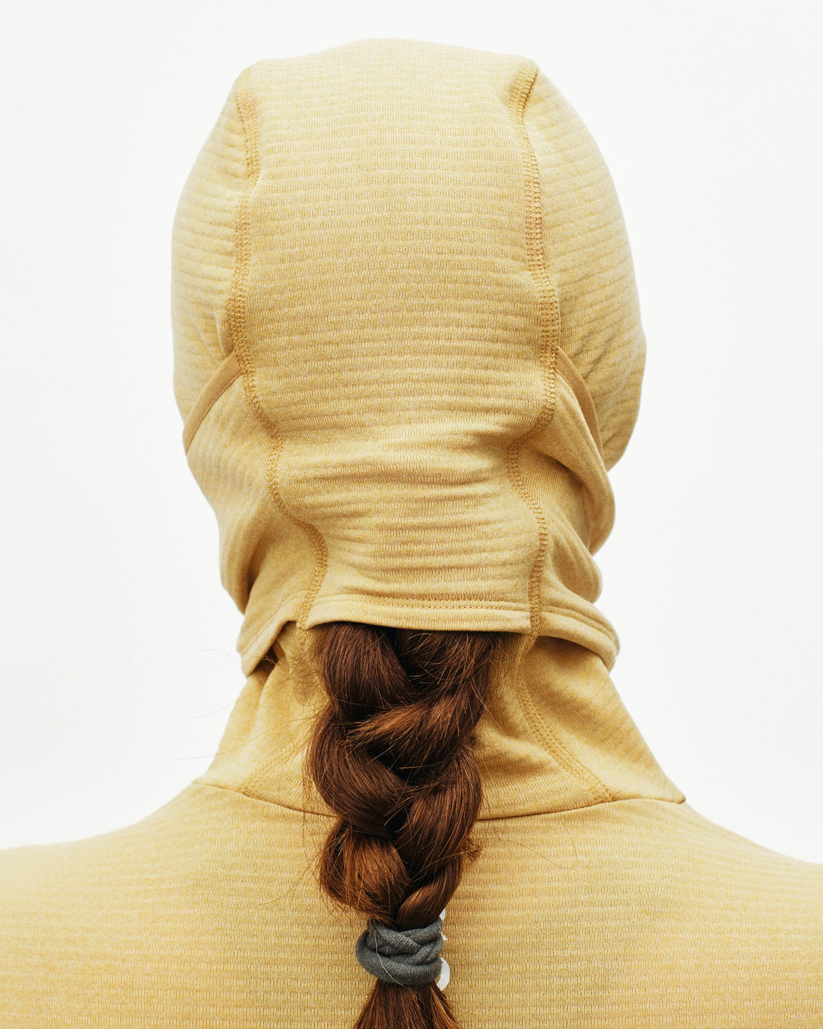 Yellow Thermal Hooded Windproof base layer on model, rear view with hood up and ribbed texture #Color_Camel / Maroon