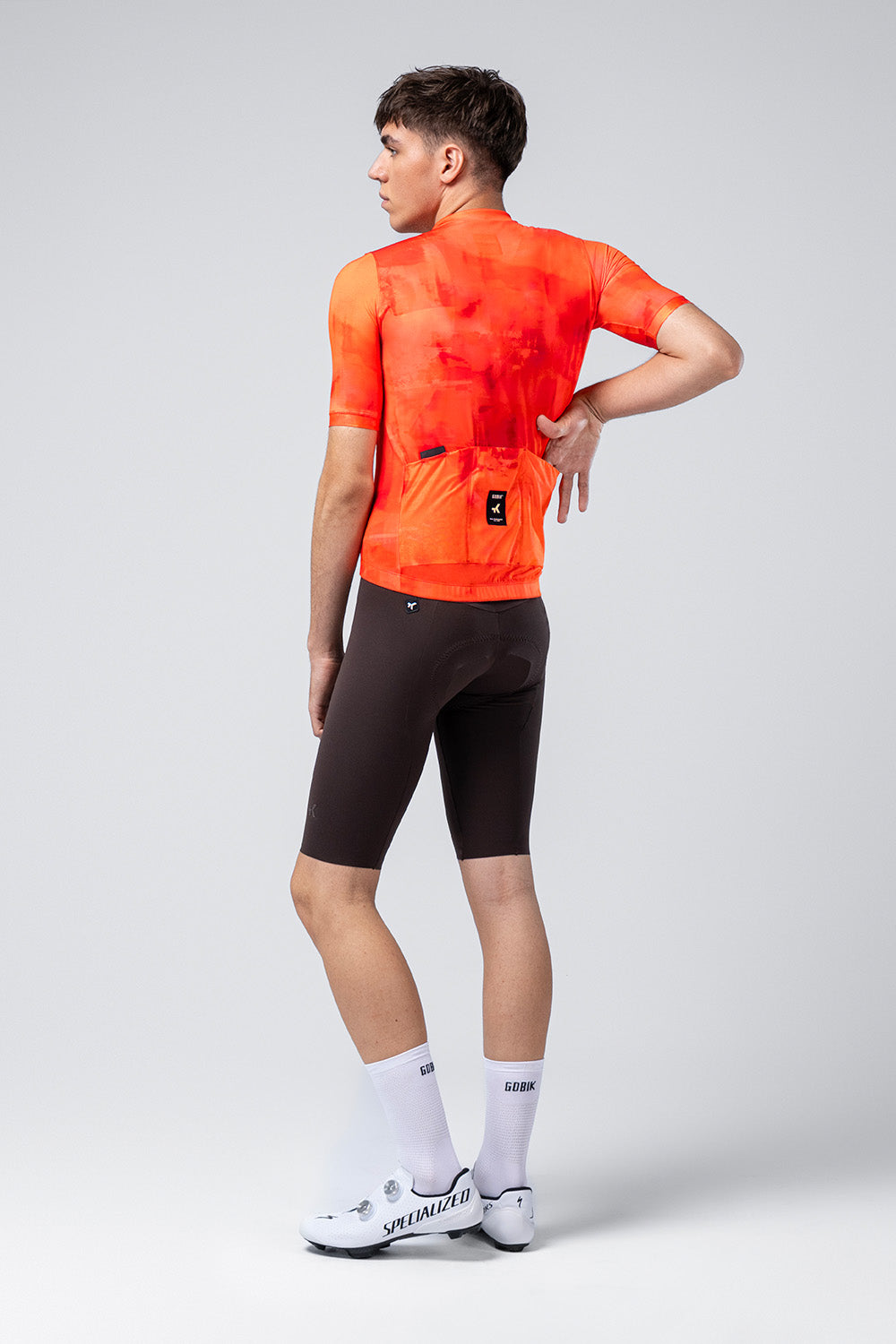 Maillot Gobik Stark en Gerbera, detalle de la espalda y los bolsillos #Color_Gerbera
