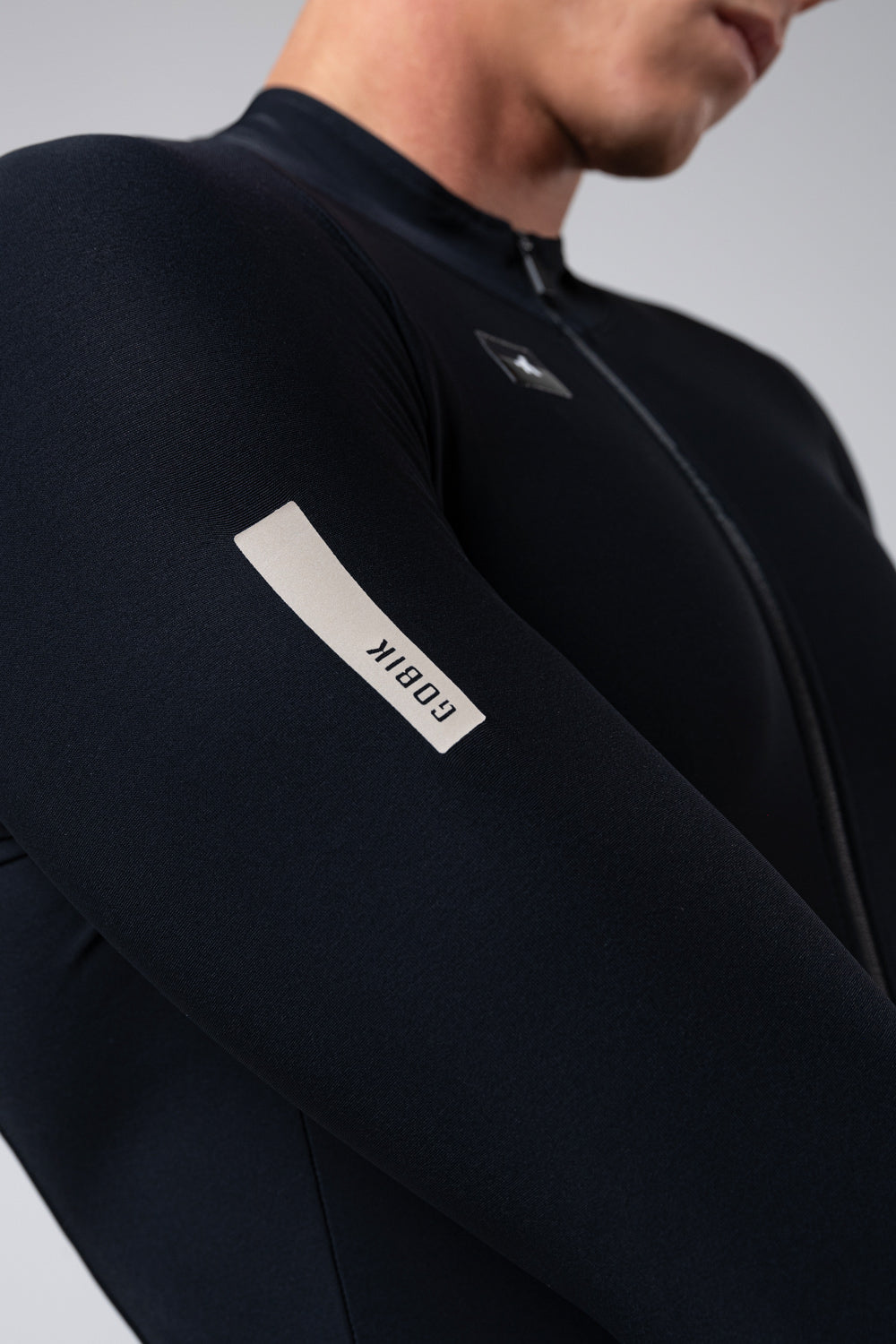 Maillot Gobik Pacer Solid 2.0 en Jasper, detalle del bolsillo lateral #Color_Jasper