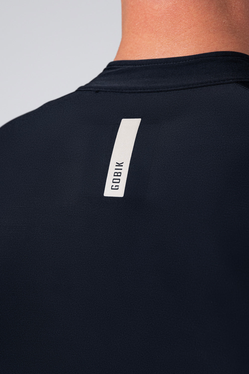 Maillot Gobik Pacer Solid 2.0 en Jasper, detalle de los bolsillos traseros #Color_Jasper