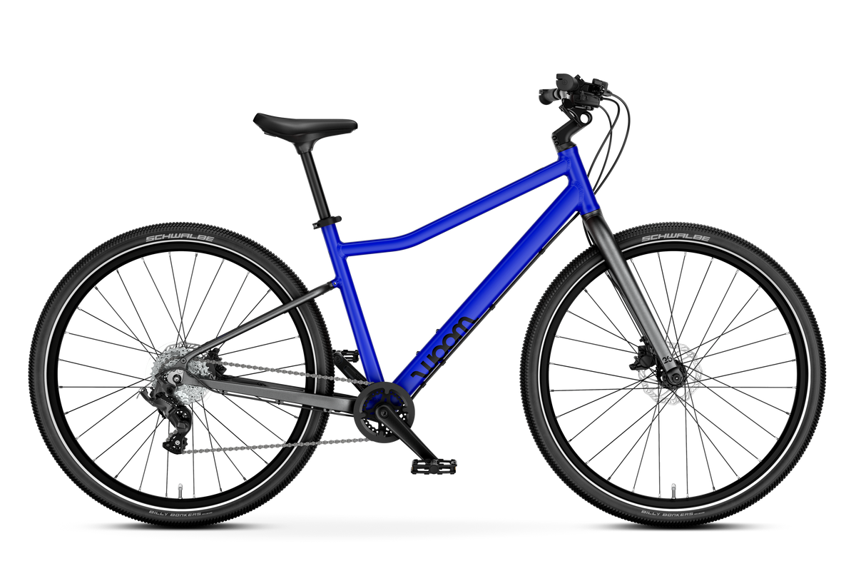 Bicicleta infantil woom EXPLORE 6 en Azul magnético, lateral #Color_Azul magnético