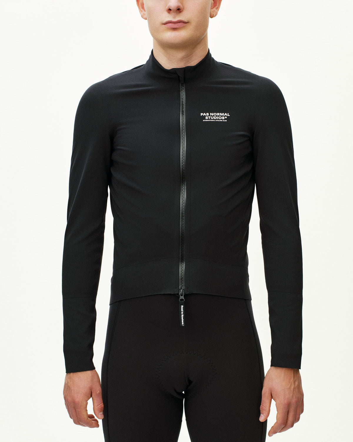 Black Mechanism Thermal cycling jacket on model with full zip and white chest logo #Color_Black