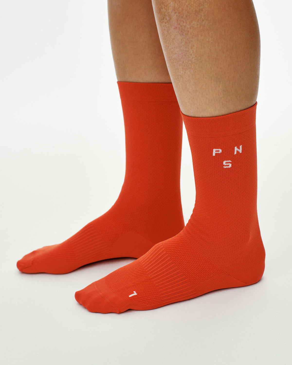 Race Socks Hibiscus Orange detalle de logotipo #Color_Hibiscus Orange
