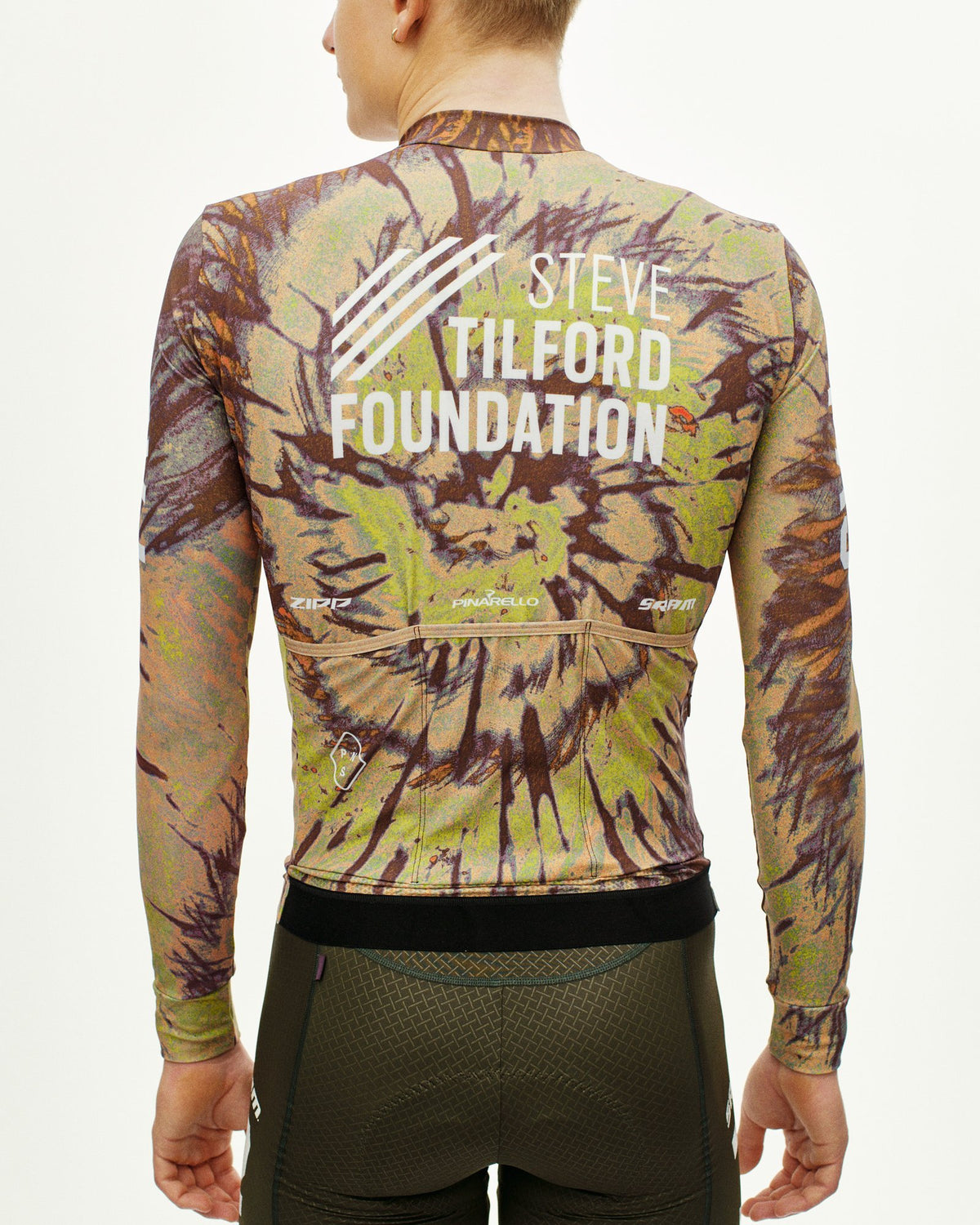 Maillot largo Pas Normal Studios STFR Mechanism en STFR Beige, de espaldas sobre el ciclista #Color_STFR Beige