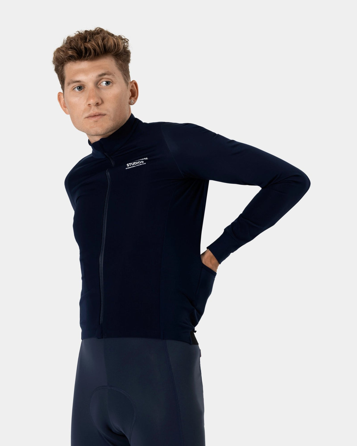 Maillot largo térmico Pas Normal Studios Mechanism Thermal en Navy, sobre el ciclista #Color_Navy