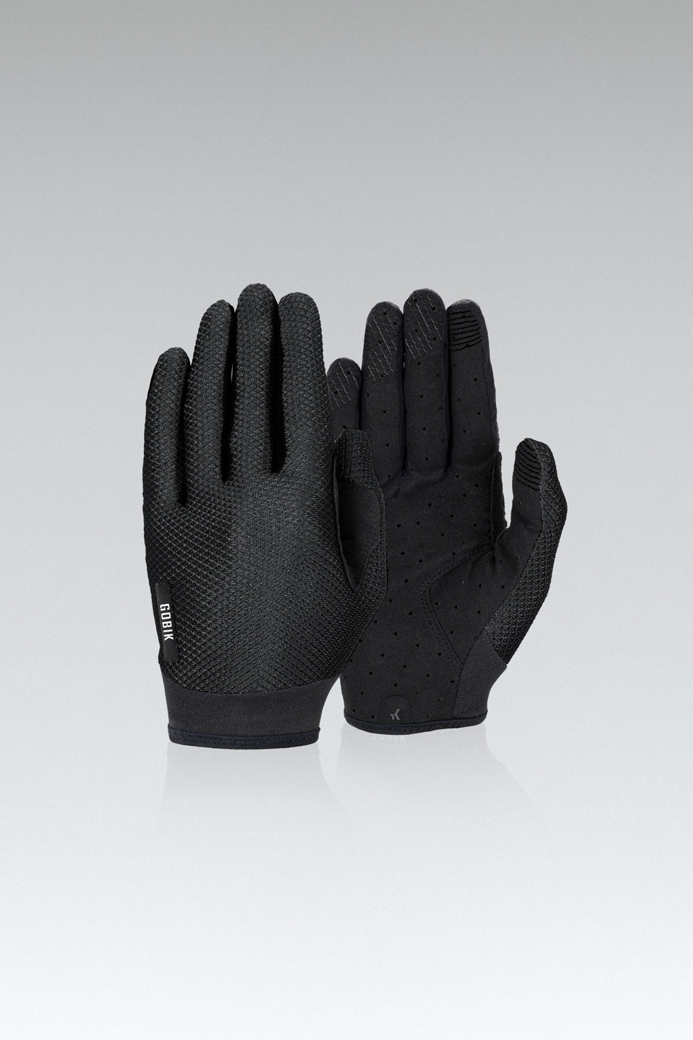 Guantes Gobik Lynx 2.0 en True Black, bodegón del par de guantes largos negros con la palma a la vista #Color_True Black
