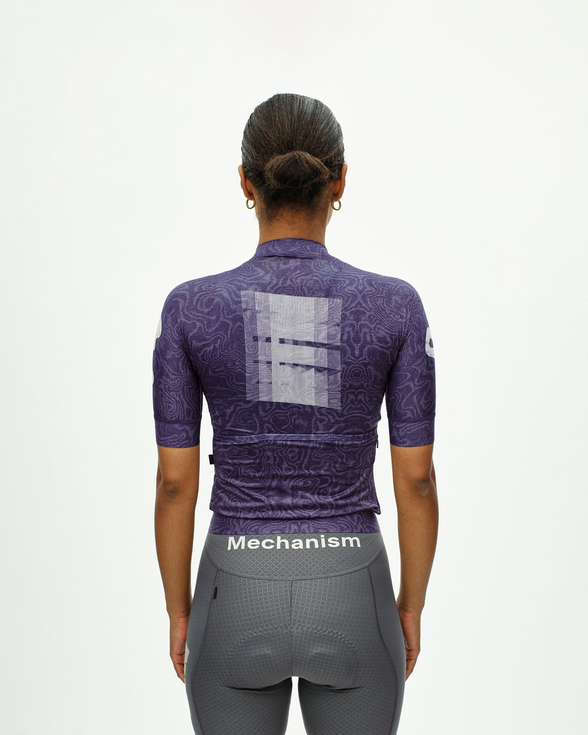 Maillot Corto Mujer Pas Normal Studios Mechanism Logo en AOP RTN Dark Purple, foto de modelo trasera #Color_AOP RTN Dark Purple