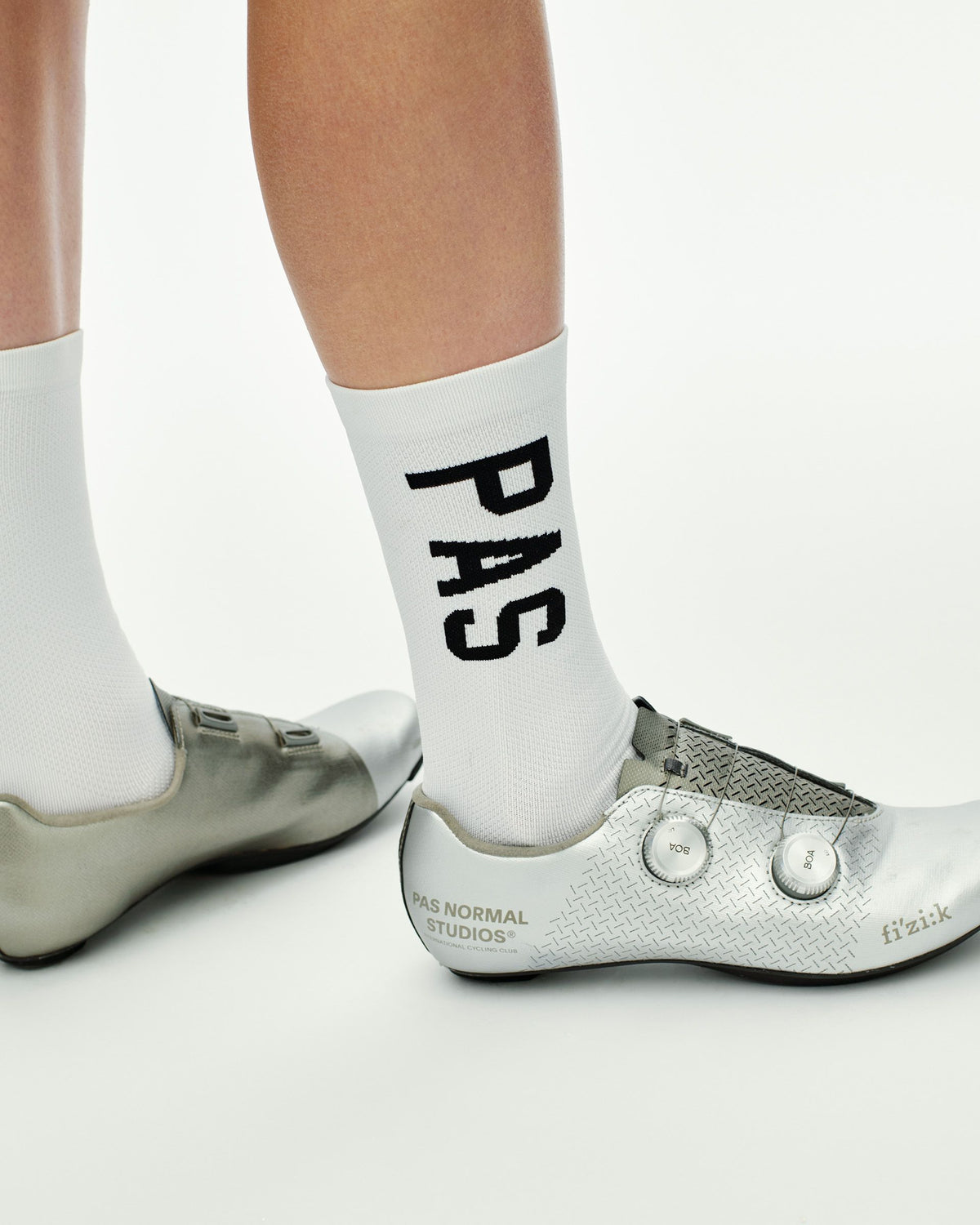 White PAS Race cycling socks on model with black logo text #Color_White