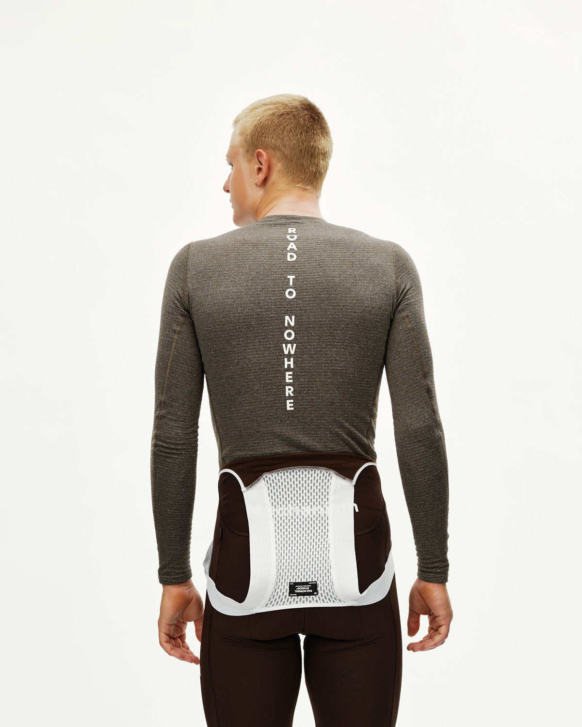 Dark Coffee brown Essential thermal long sleeve cycling baselayer on model, rear view with Road To Nowhere back print #Color_Dark Coffee