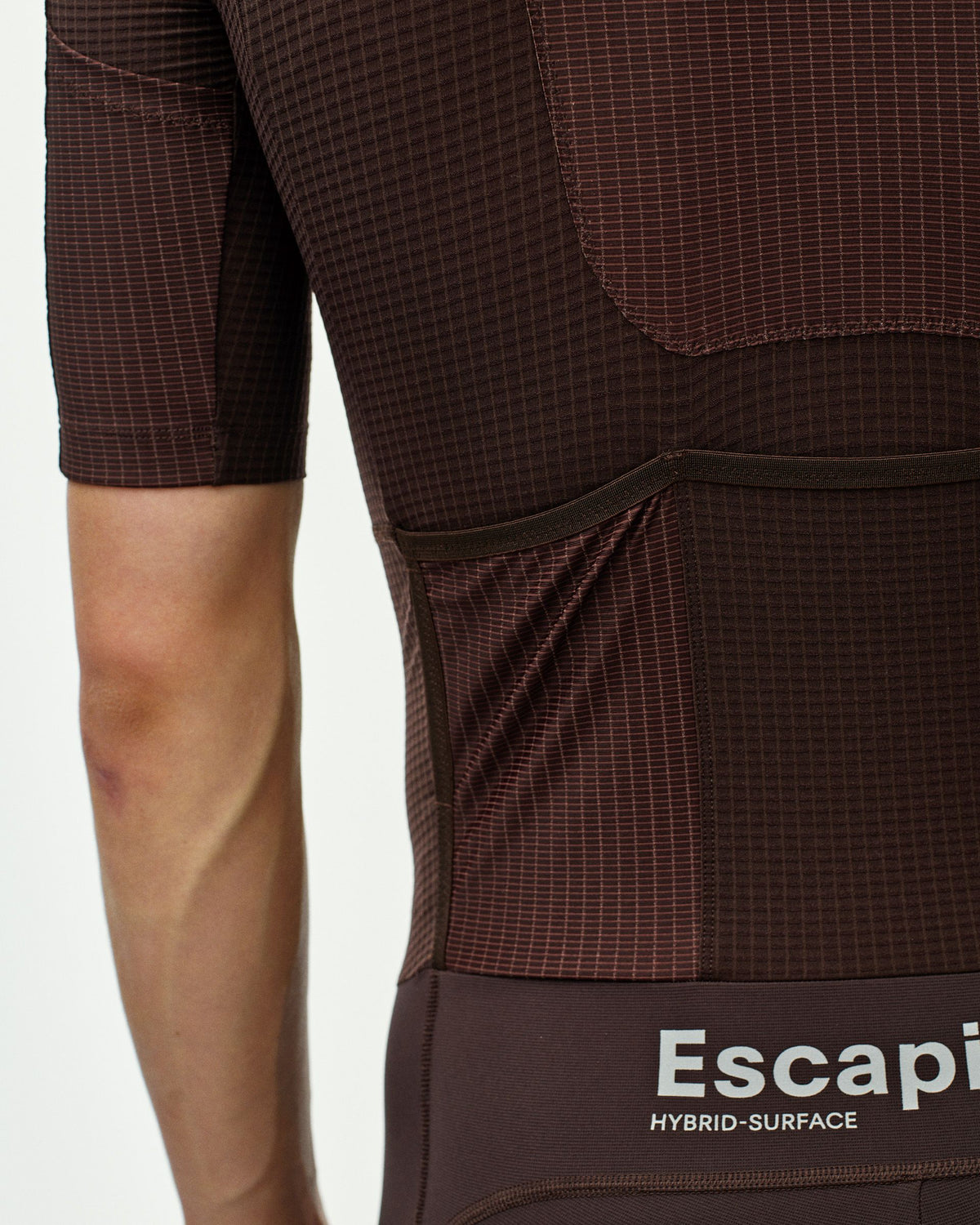 Dark Red Escapism Speedsuit on model showing ribbed fabric texture and side pocket detail #Color_Dark Red