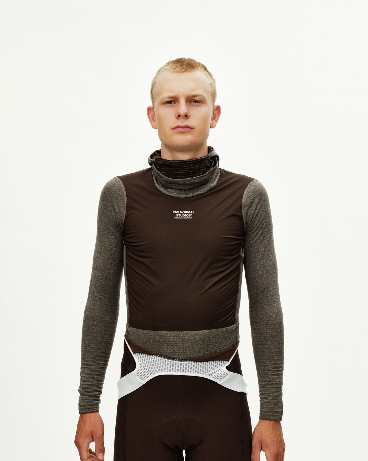 Dark Coffee brown Thermal Hooded Windproof cycling base layer on model, front view with turtleneck collar and white logo #Color_Dark Coffee