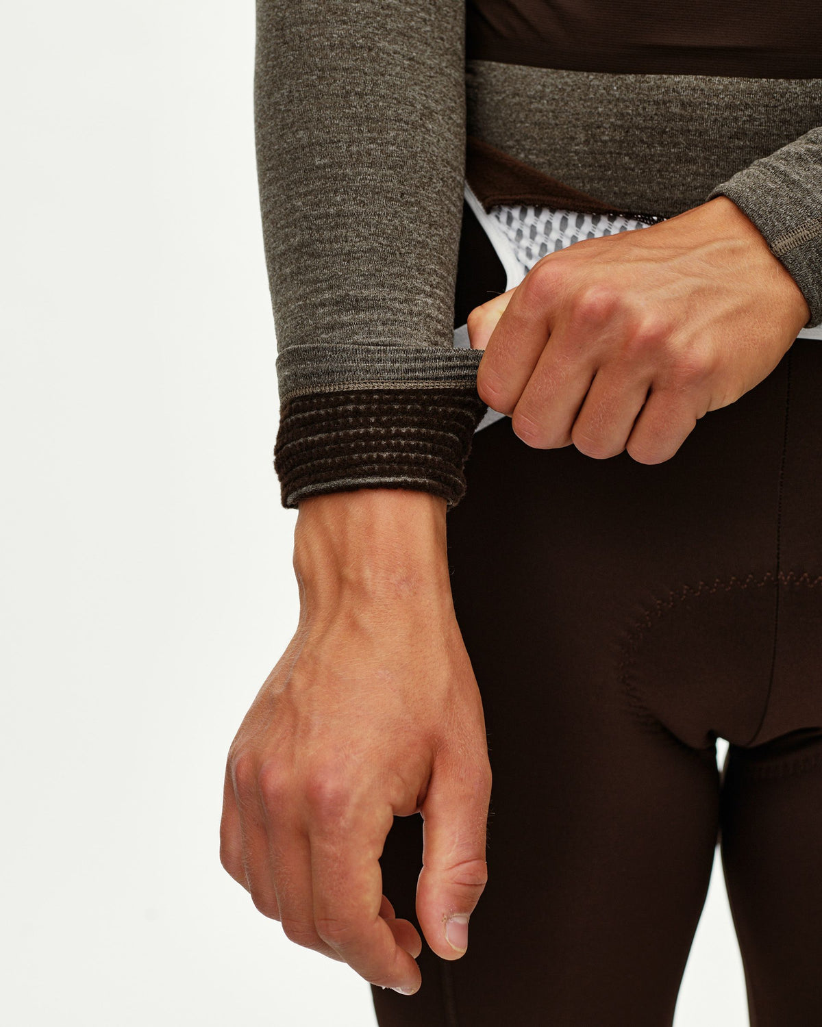 Dark Coffee brown Thermal Hooded Windproof cycling base layer, detail on model showing ribbed cuff on sleeve #Color_Dark Coffee